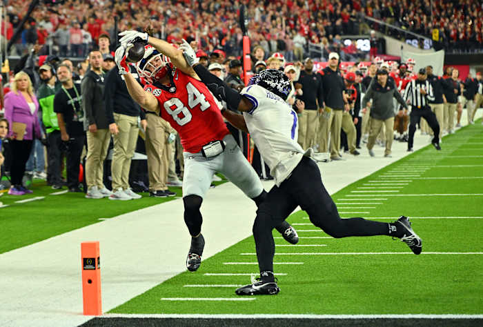 Jan 9, 2023; Inglewood, CA, USA; Georgia Bulldogs wide receiver Ladd McConkey (84) cannot catch a pass against TCU Horned Frogs cornerback Tre'Vius Hodges-Tomlinson (1) during the first half in the CFP national championship game at SoFi Stadium. Mandatory Credit: Jayne Kamin-Oncea-USA TODAY Sports